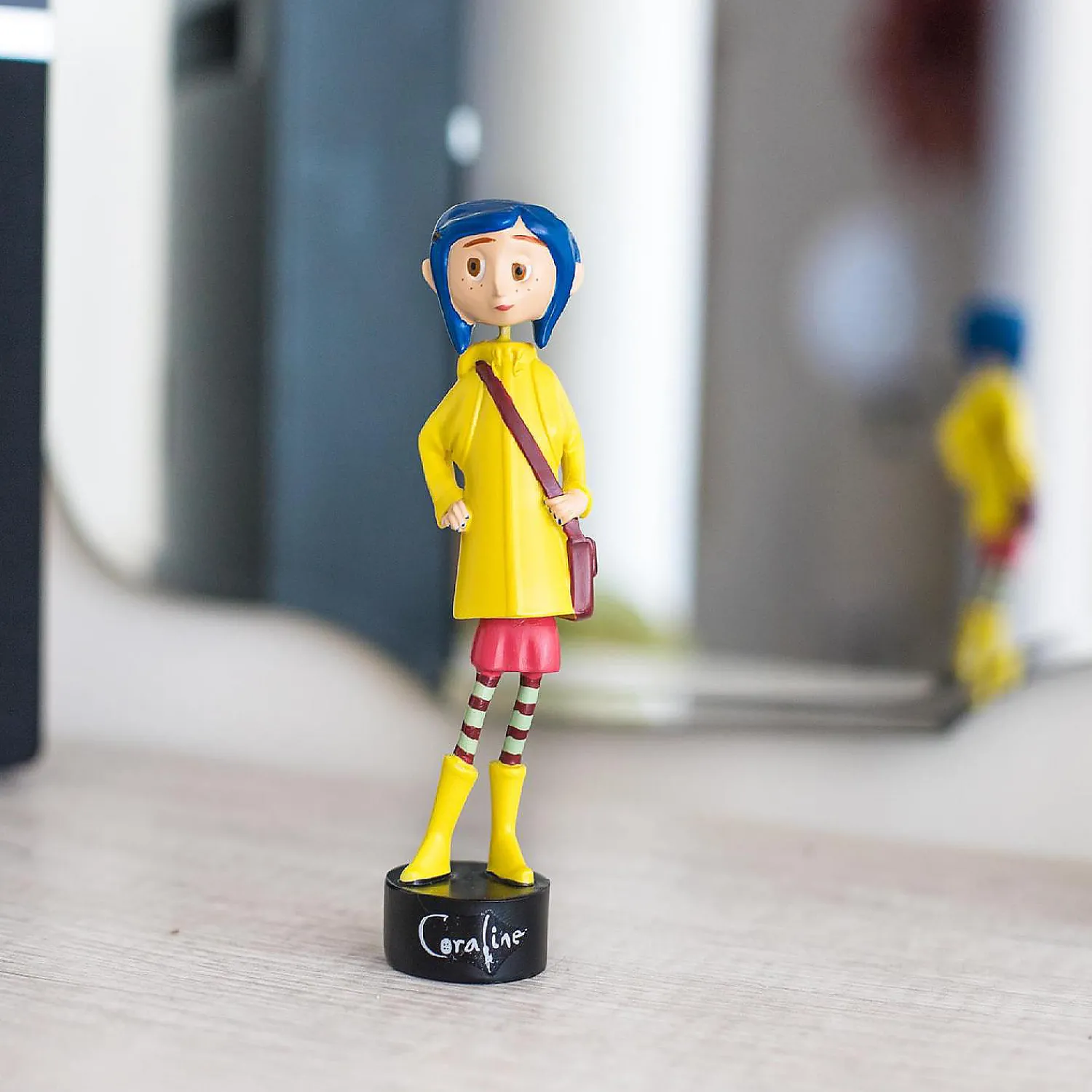 coraline_in_rain_coat_pvc_3.webp Oriental Trading Character Toys*Coraline In Rain Coat Pvc Bobble Figure 5 Inches Tall