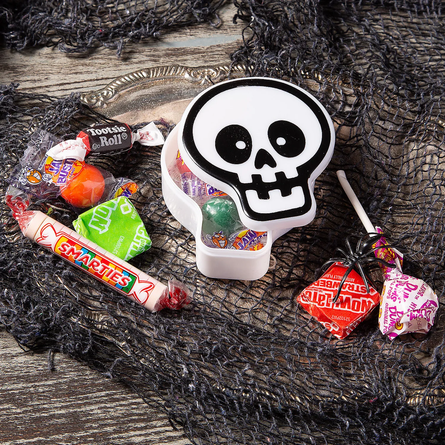skullshaped_bpafree_plast_1.webp Skull-Shaped Bpa-Free Plastic Favor Containers - 12 Pc.<Oriental Trading Store