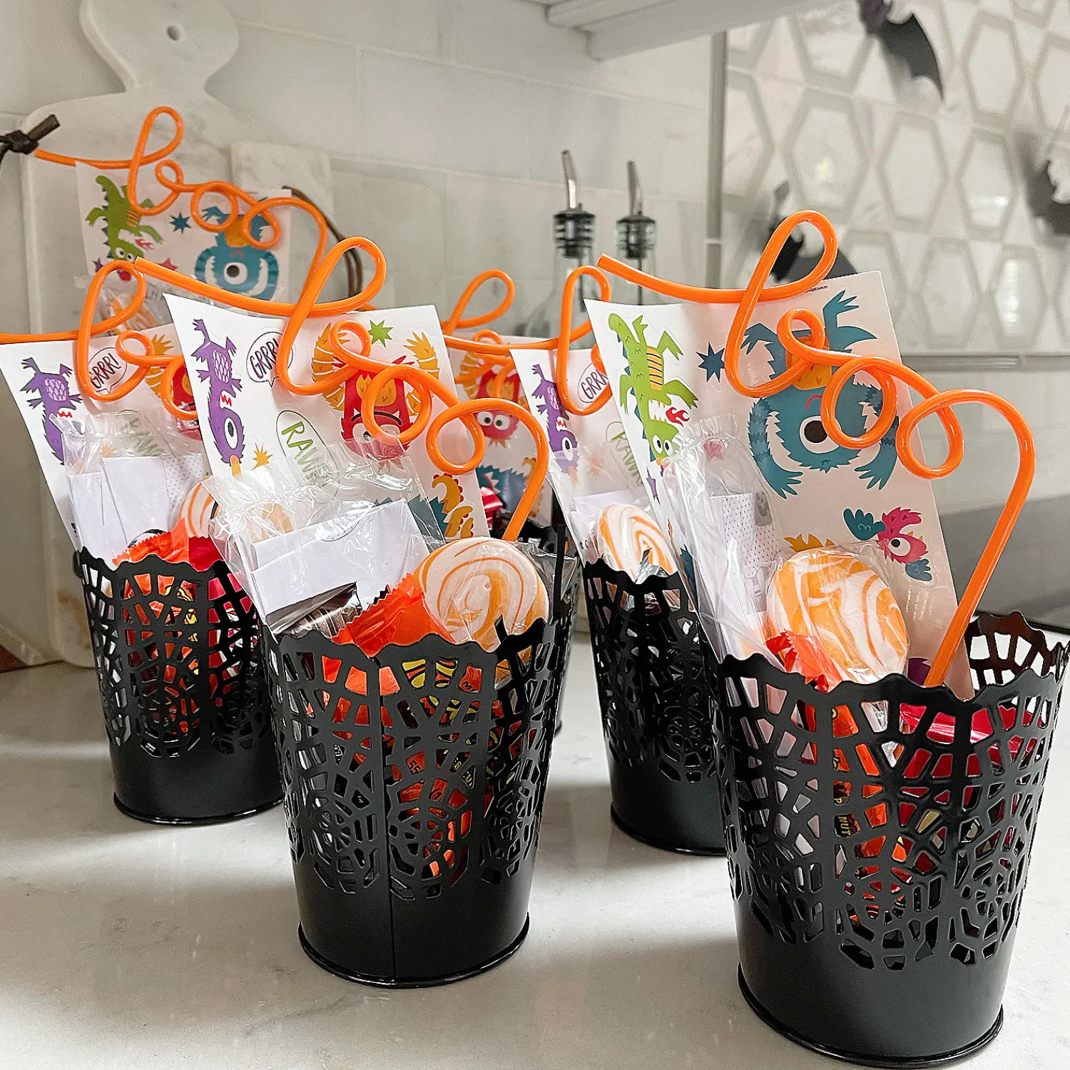small_halloween_diecut_sp_1.webp Small Halloween Die-Cut Spider Web Pails - 6 Pc.<Oriental Trading Online